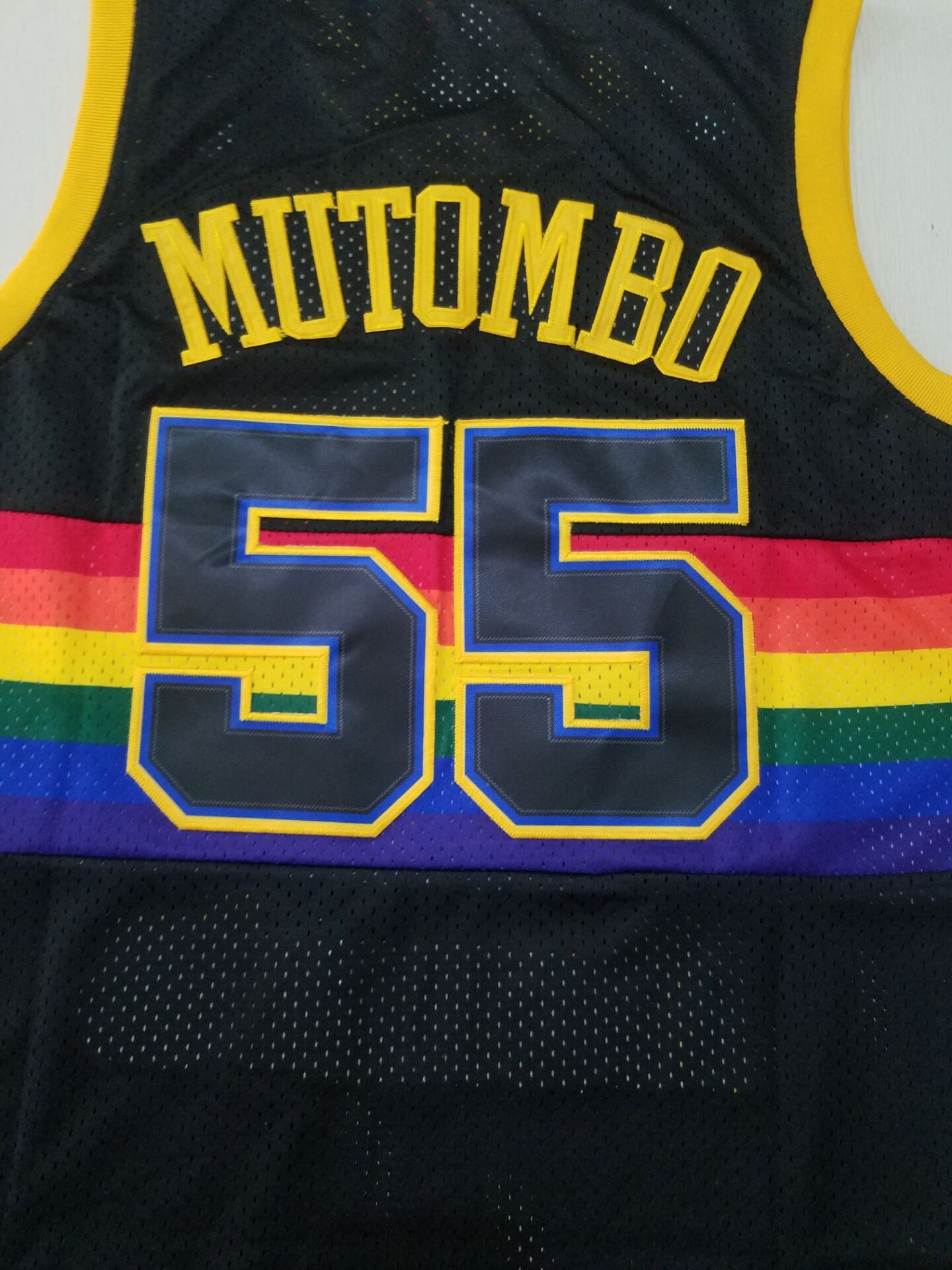 Men's Denver Nuggets Dikembe Mutombo 1991-92 Black Hardwood Classics Swingman Jersey