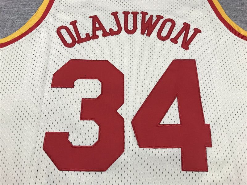 Men's Houston Rockets Hakeem Olajuwon #34 Cream Chainstitch Swingman Jersey